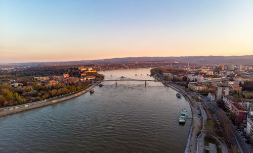 High angle view of river amidst buildings in city