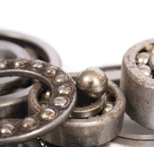Close-up of rusty chain against white background