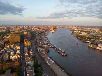 High angle view of city at sunset