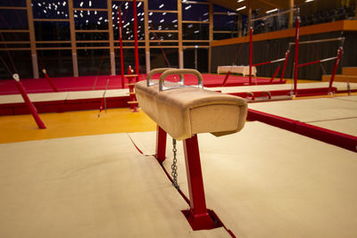 Empty chairs and table on floor