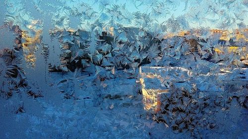 Full frame shot of wet glass window