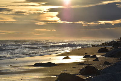 Scenic view of sea against sky during sunset