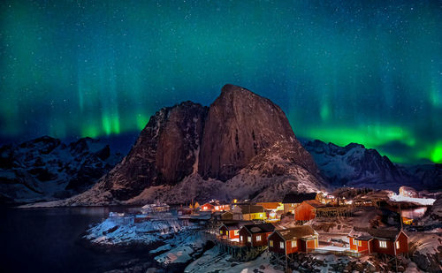 High angle view of townscape against sky at night