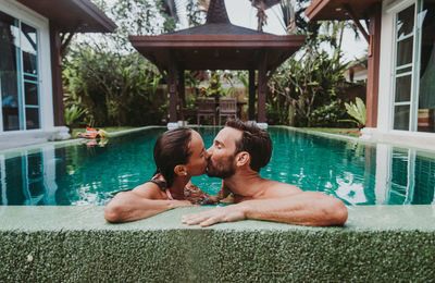 Couple in swimming pool