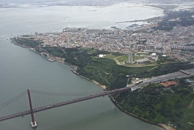 High angle view of cityscape by sea