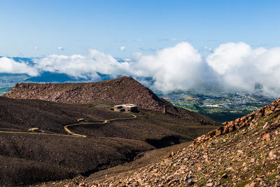Panoramic view of volcanic landscape against sky