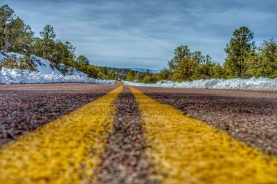 Surface level of road against sky