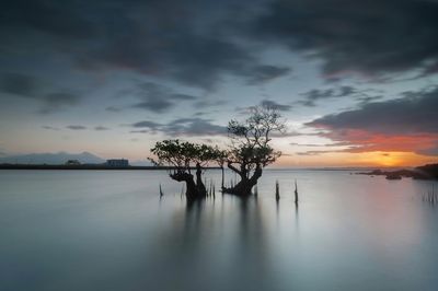 Scenic view of sea against dramatic sky