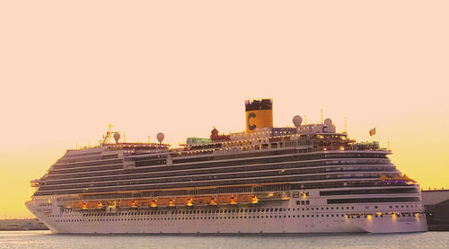 View of ship in sea against clear sky