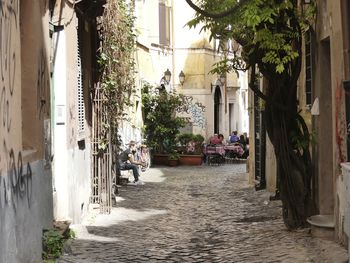 Alley amidst buildings in city