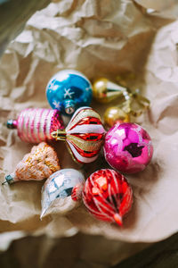 High angle view of multi colored eggs on table