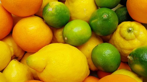 Full frame shot of oranges in market