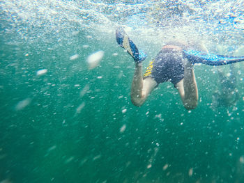 Man swimming in sea