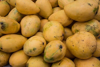 Full frame shot of mangoes for sale at market stall