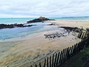 Scenic view of beach against sky