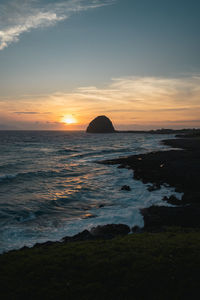 Scenic view of sea against sky during sunset