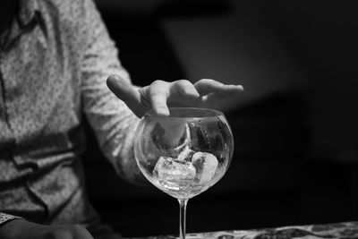 Close-up of hand holding wineglass