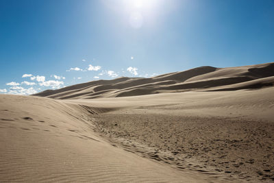 Scenic view of desert against sky