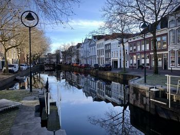 Canal amidst buildings in city