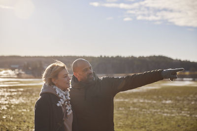 Couple walking at sunny day