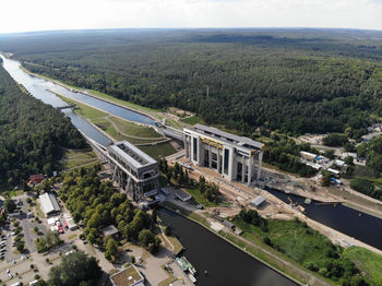 High angle view of cars on road against sky