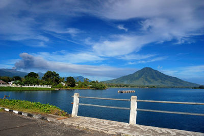 Scenic view of lake against blue sky