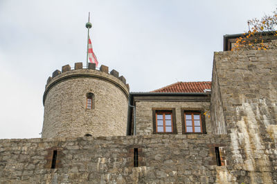 Low angle view of historic building against clear sky