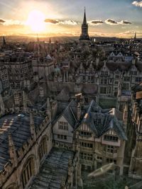 Aerial view of city at sunset