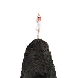 Low angle view of rock against clear sky