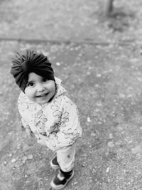 Portrait of cute girl standing outdoors