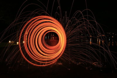 Light trails in sky at night