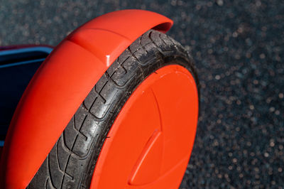 High angle view of orange car on road