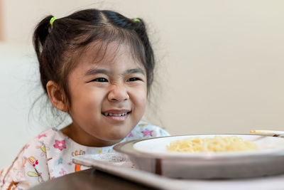 Portrait of cute girl smiling