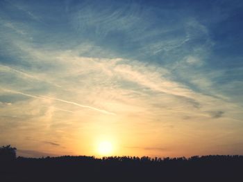 Scenic view of silhouette landscape against sky during sunset