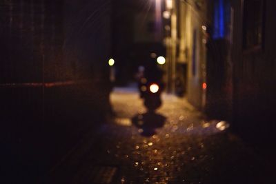 Defocused lights on road at night