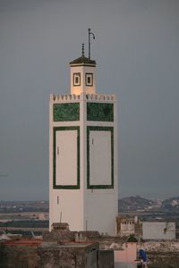 Tower with buildings in background