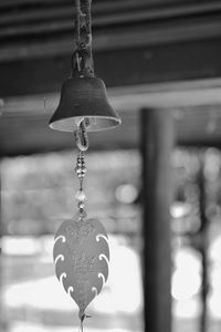 Close-up of heart shape decoration hanging from ceiling