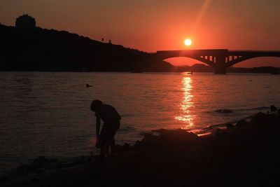 Scenic view of sunset over river