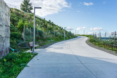 A wide walkway rises up to the wilson way bridge in tacoma, washington.