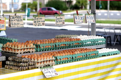 Eggs in cartons on table for sale