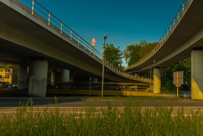 View of bridge in city against sky