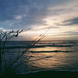 Scenic view of sea against dramatic sky