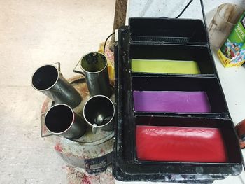 High angle view of paintbrushes in container