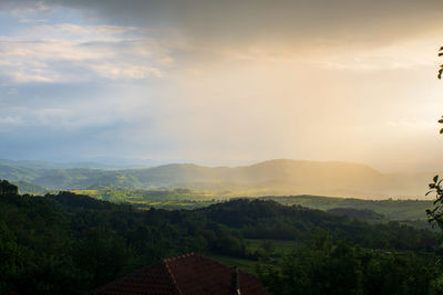 Scenic view of landscape against sky during sunset