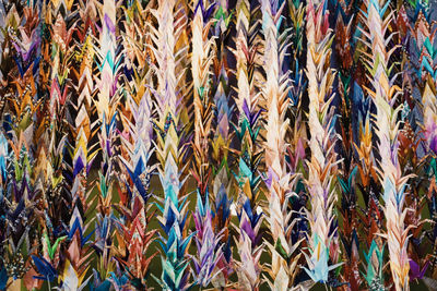 Full frame shot of colorful paper cranes