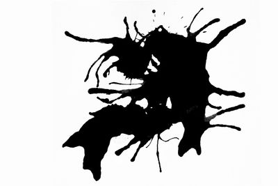 Close-up of silhouette black against white background