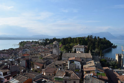 High angle view of buildings against sky at town