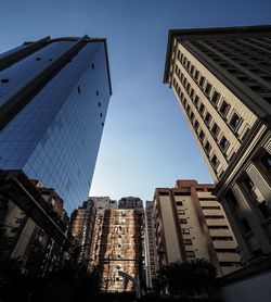 Low angle view of modern buildings against sky