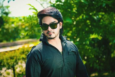 Portrait of young man wearing sunglasses