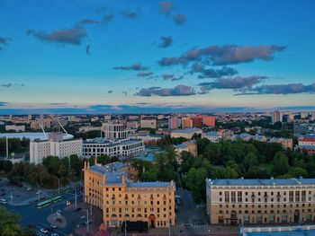 High angle view of buildings in city against sky